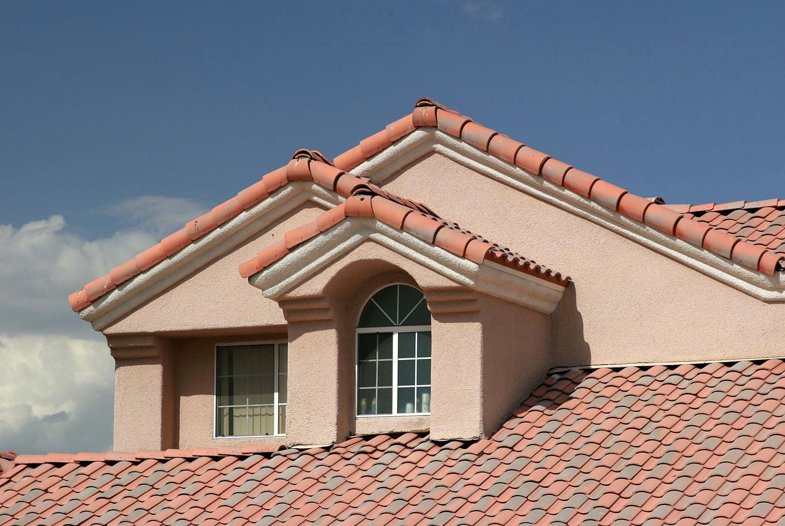 Services include replacement or repair of roof, tearing off old roof. 